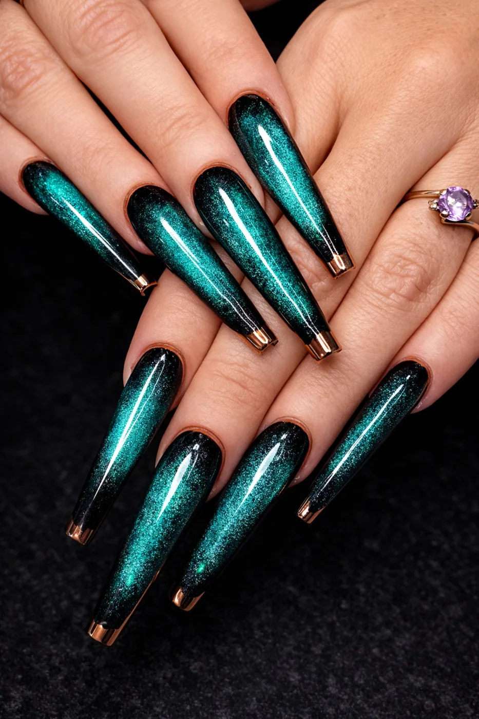 Emerald green cat-eye nail design
