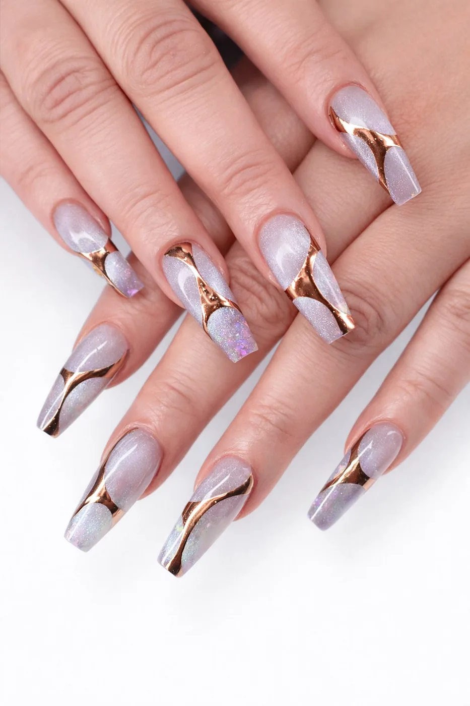 Lilac and rose-gold nail design created for a polished beauty visit